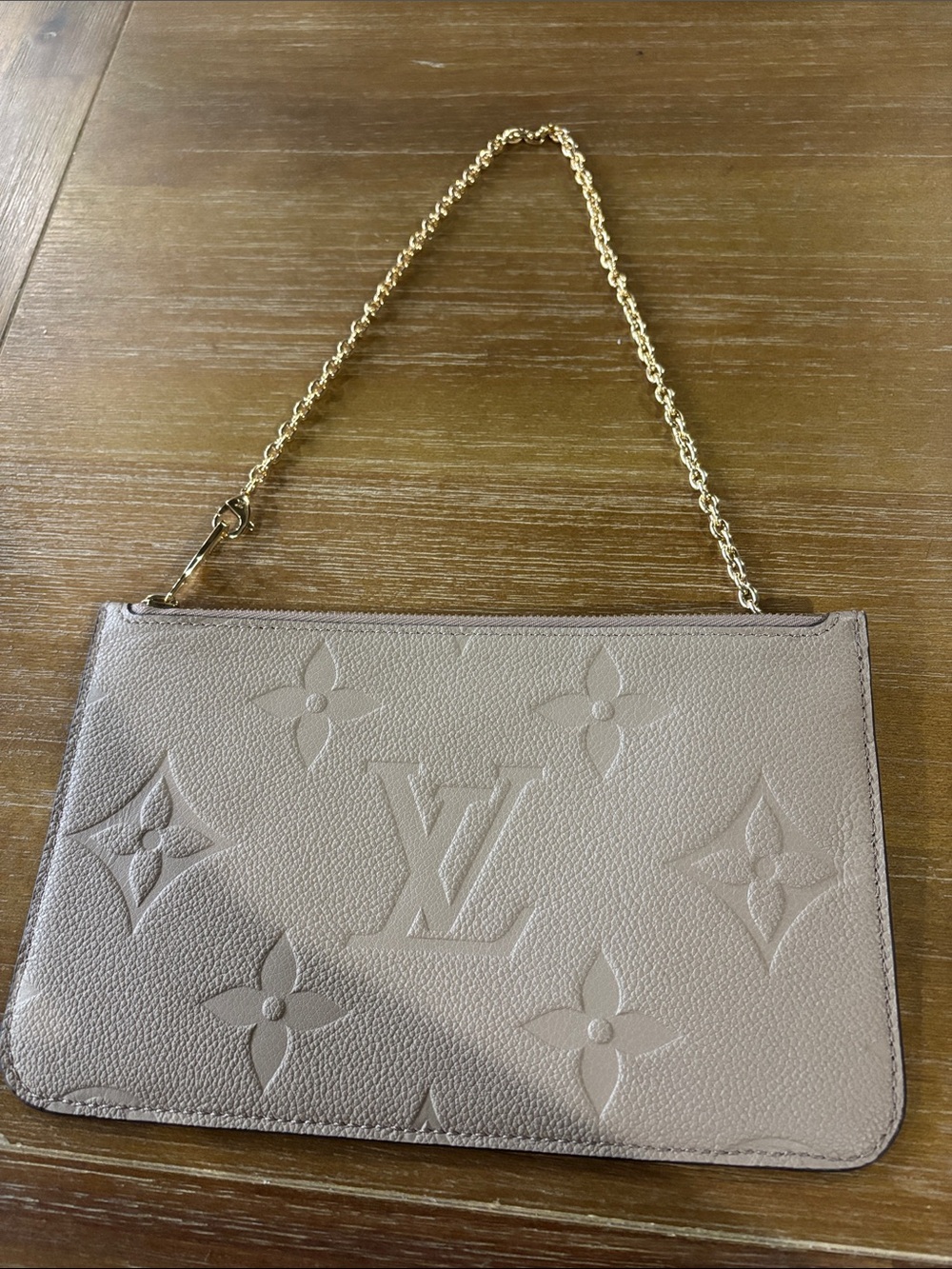 Louis Vuitton  Embossed Monogram Pouch in Turtledove with Louis Vuitton chain